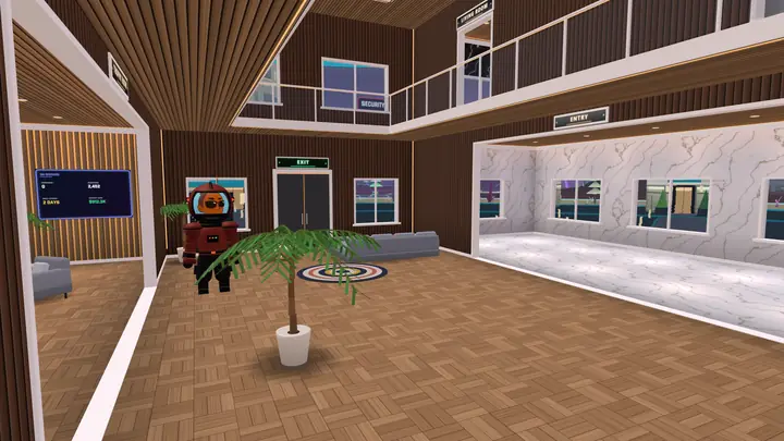 A two-storey atrium inside a member's home: walnut walls, a marble gallery, a mezzanine and the owner standing by a palm