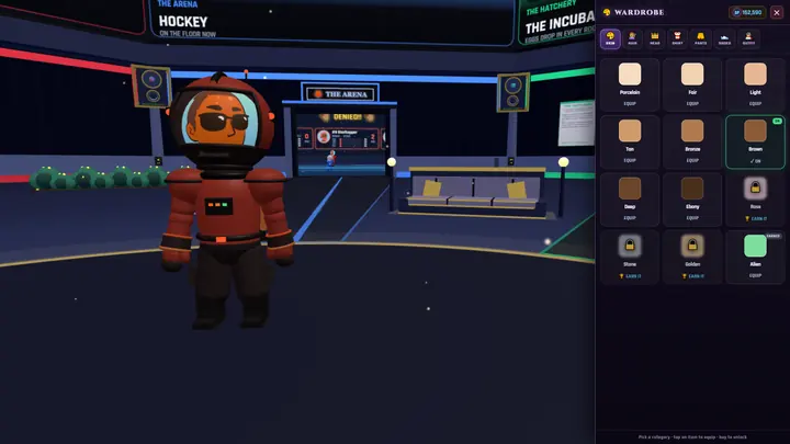 A member in an astronaut suit beside the open wardrobe panel of skin tones